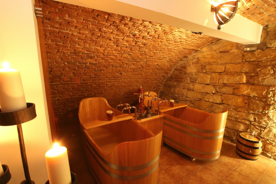 Caroline Bernard Beer Spa Prague with Beer & Massage Option - The beer bath: temperature, tradition, and why staff matter