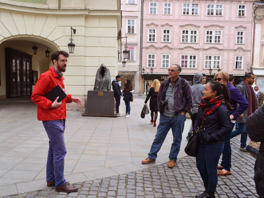 Prague: 2-Hour Old Town and Jewish Ghetto Walking Tour - Jan Hus at Old Town Square and the Astronomical Clock symbols