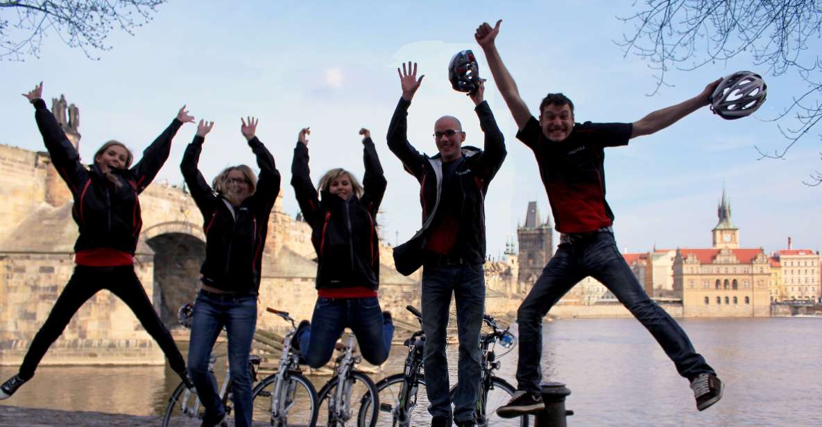 Prague: Bike or E-Bike City Tour with A Local Guide - Gear that keeps the ride pleasant: gloves, poncho, and calm pacing