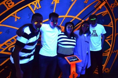 Prague Black Light Mini Golf and Games with free Drinks - More Than Golf: Jenga, Arcade Games, and Photo Fun