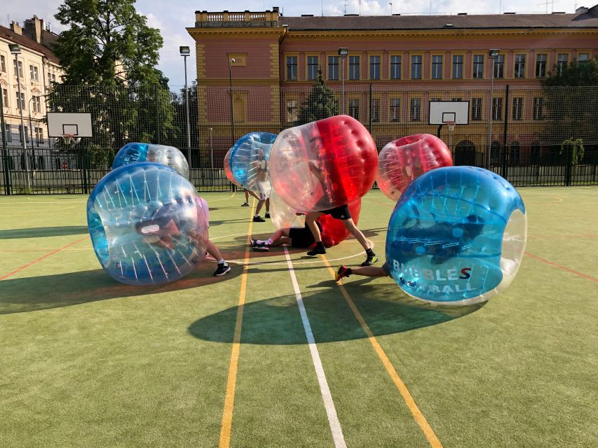 Prague: Bubbles football in city centre of Prague - Entering The Bubble Football Field Behind a Huge Brown Gate