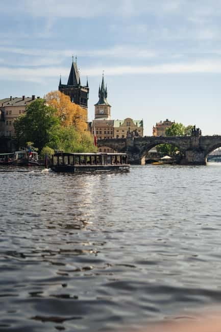 Prague: Canal Cruise Around Charles Bridge - The boat experience: small, cozy, and snack-forward