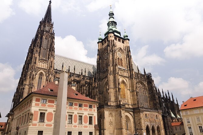 Prague Castle Tour Including Admission Ticket - 2.5 Hour - St. Vitus Cathedral: symbolism, coronations, and the big interior payoff