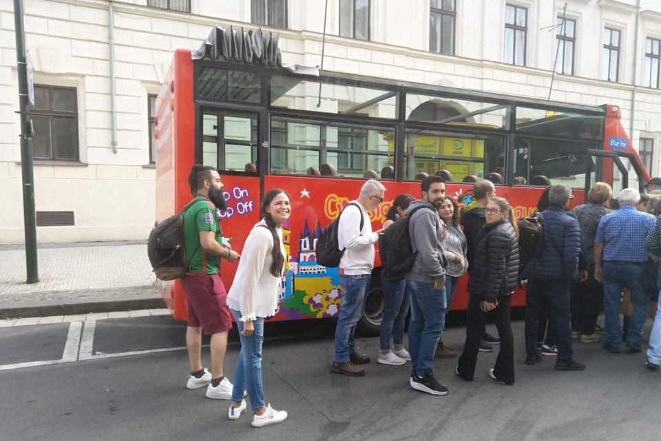 Prague: City Sightseeing HOHO Bus Tour & Optional Boat Tour - Audio guide in 25 languages and onboard comfort: what to expect