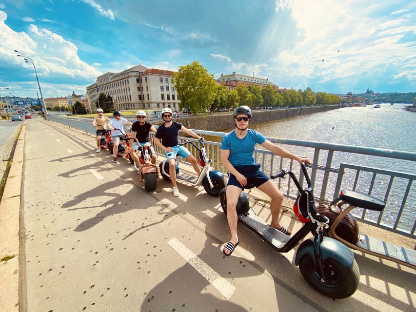 Prague: Fat Tire E-Scooter Guided Tour - Cobblestones, brakes, and staying comfortable: the real ride reality