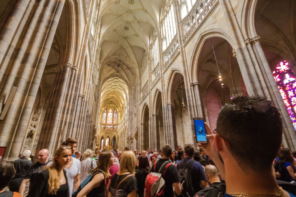 Prague: Guided Bus & Walking Tour with River Cruise & Lunch - Charles Bridge and the Rudolfinium zone: how the downhill route helps you see more