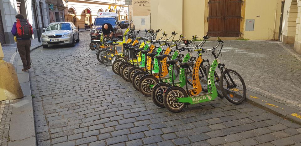 Prague: Highlights Tour on e-Scooter or eBike - Franz Kafka Museum stops and the peeing statues by David Černý