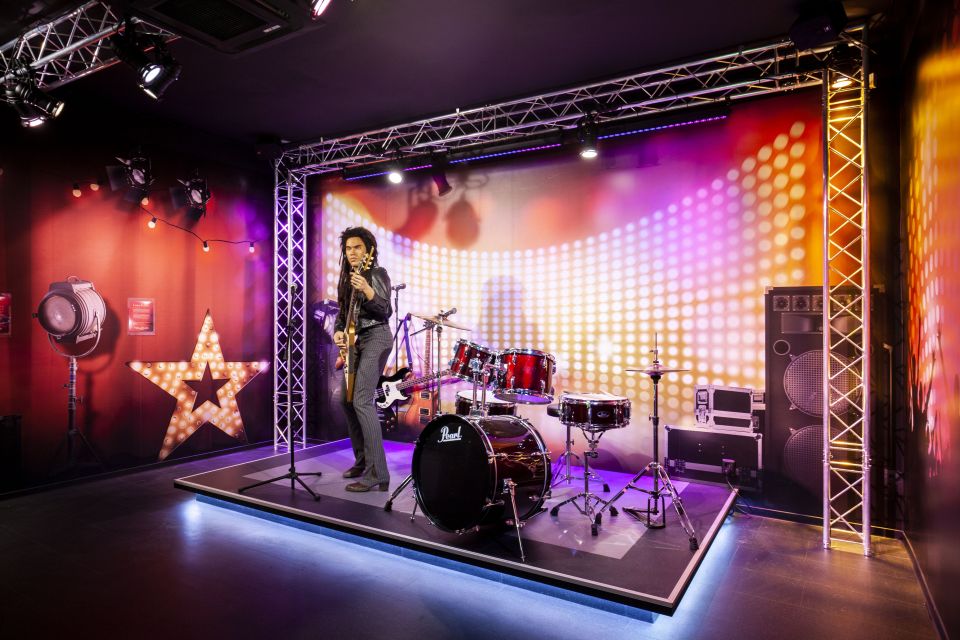 Prague: Madame Tussauds Entry Ticket - Interactive Play Bits: piano moments, quizzes, games, and props