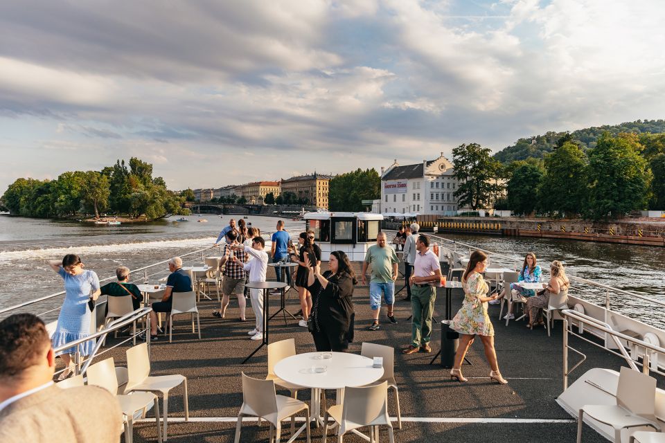 Prague: Sightseeing Dinner Cruise on Open-Top Glass Boat - Evening on the Vltava: What This Open-Top Glass Boat Feels Like